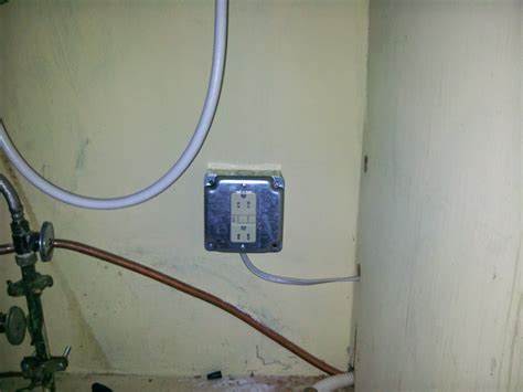 height of electrical box under sink|electrical outlet under kitchen sink.